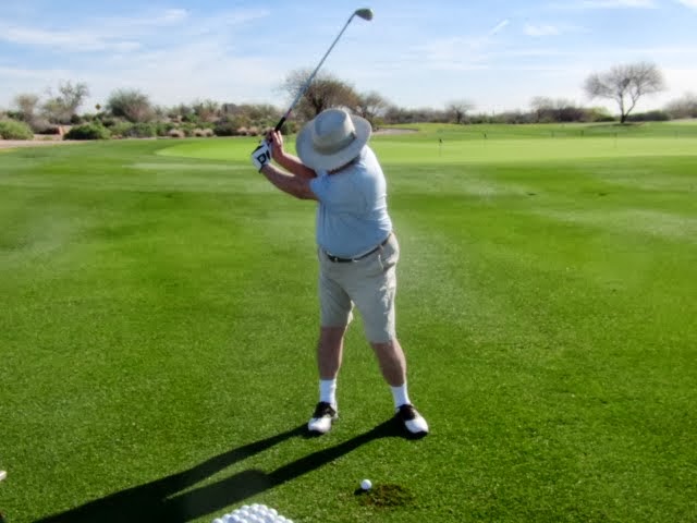 David working on his full backswing. A perfect “set”.