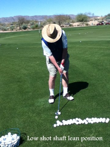 In this picture David is working on what the angle of the shaft should feel like to hit a lower shot. All that hard work paid off!