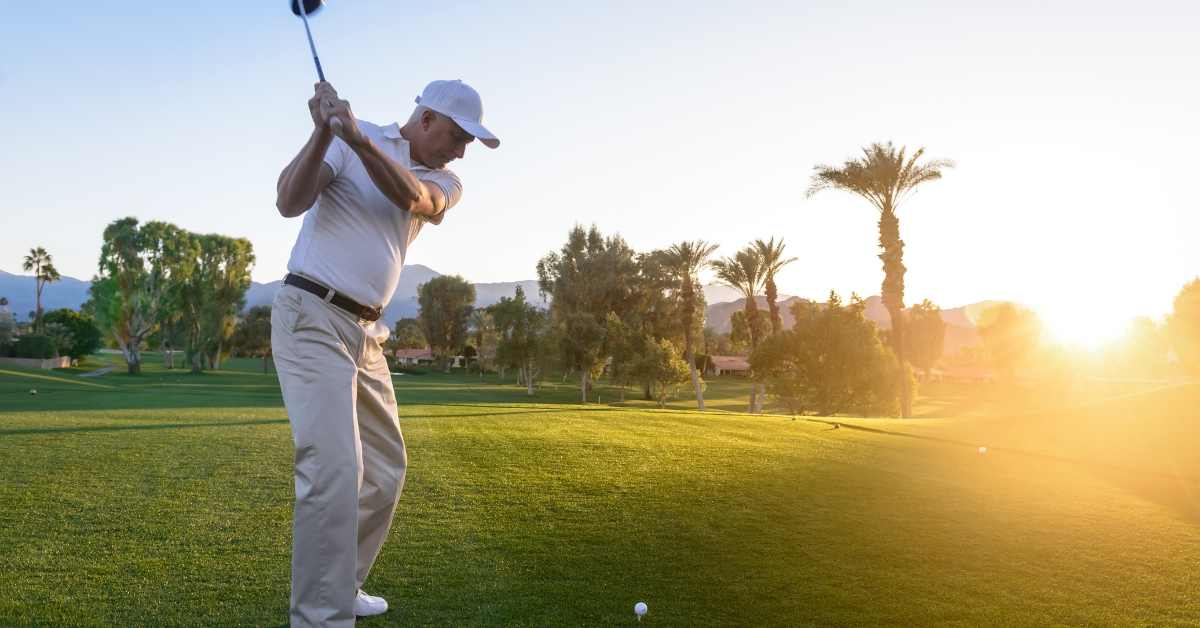 Older gentleman playing golf