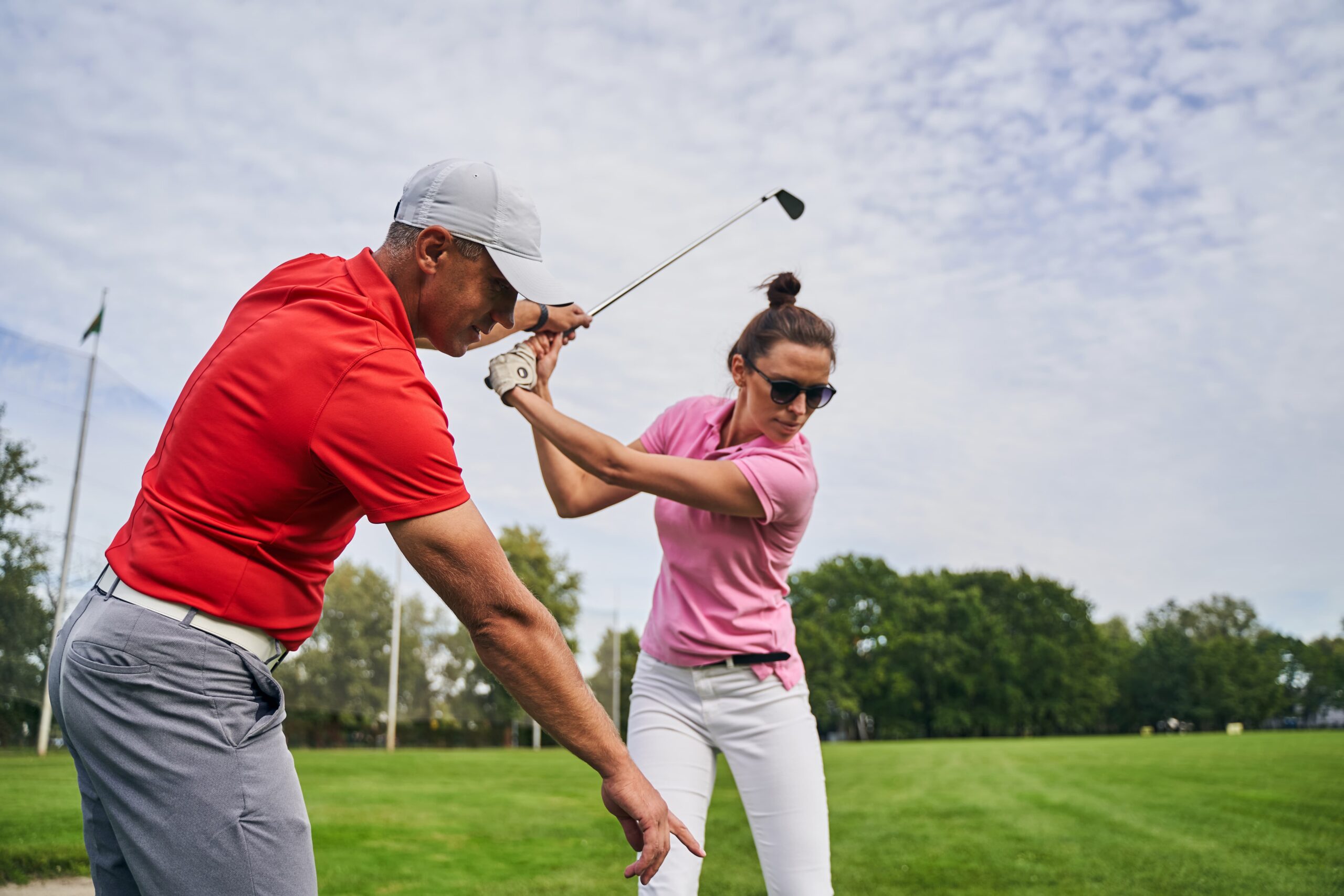 golf instruction man woman